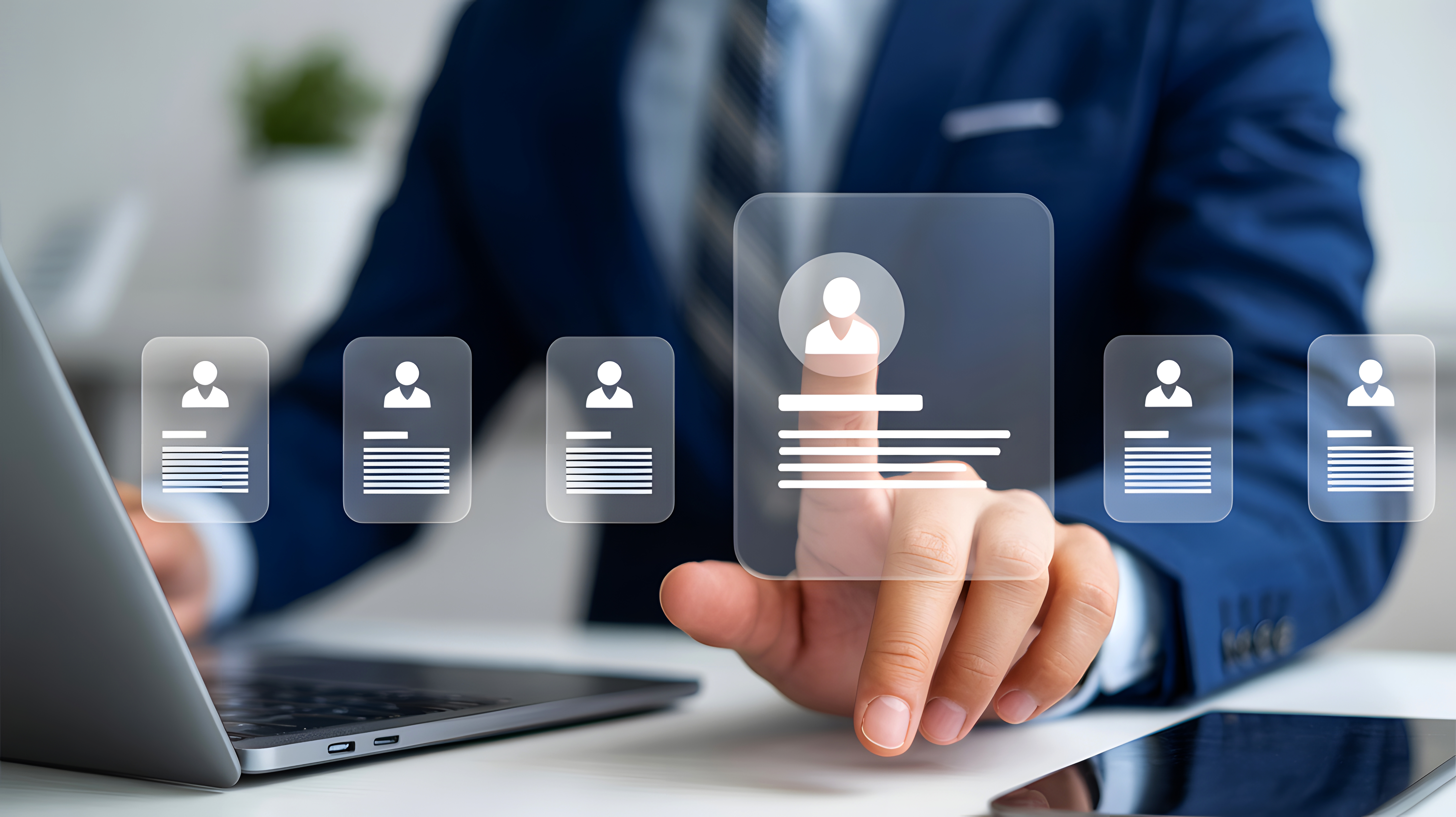 Closeup hand interacting with digital profile interface showing multiple candidate resumes